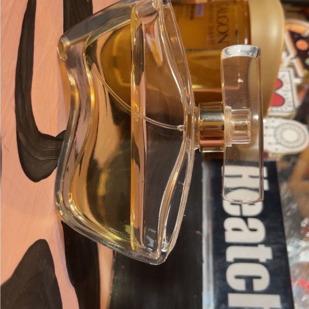 Jennifer aniston Glass Perfume with Gold Accents,